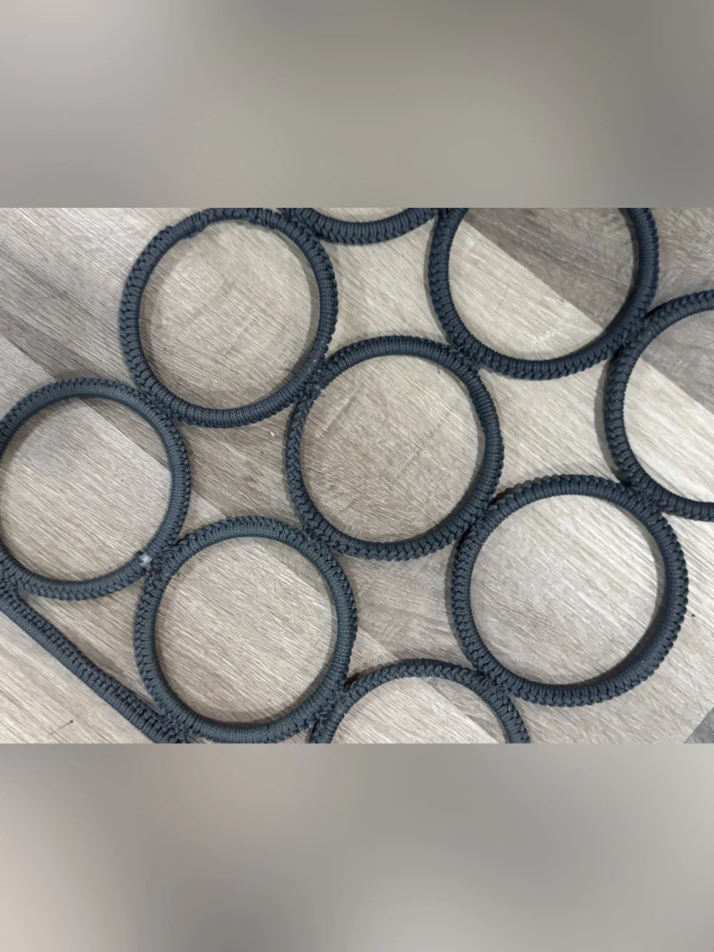 Textured scarf hanger with 18 spots